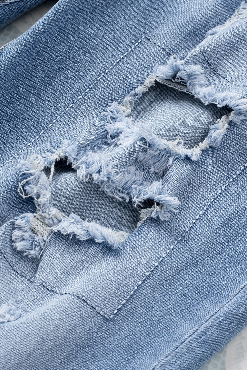 Sky Blue Buttoned Pockets Distressed Jeans