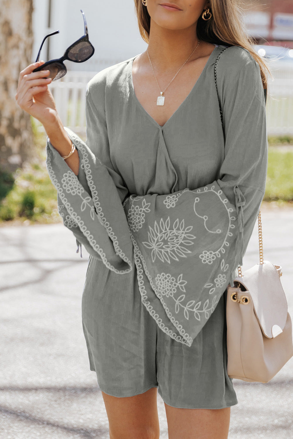 Surplice V Neck Floral Bell Sleeve Romper