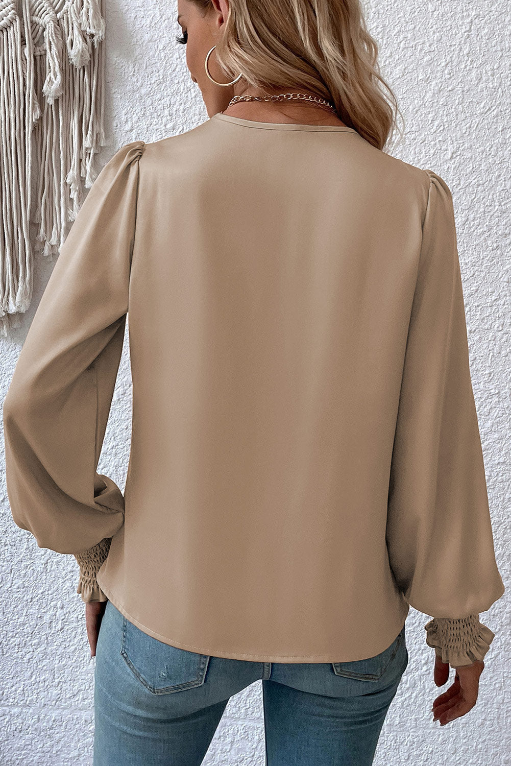 Black Solid Surplice Neck Shirred Cuffs Draped Blouse