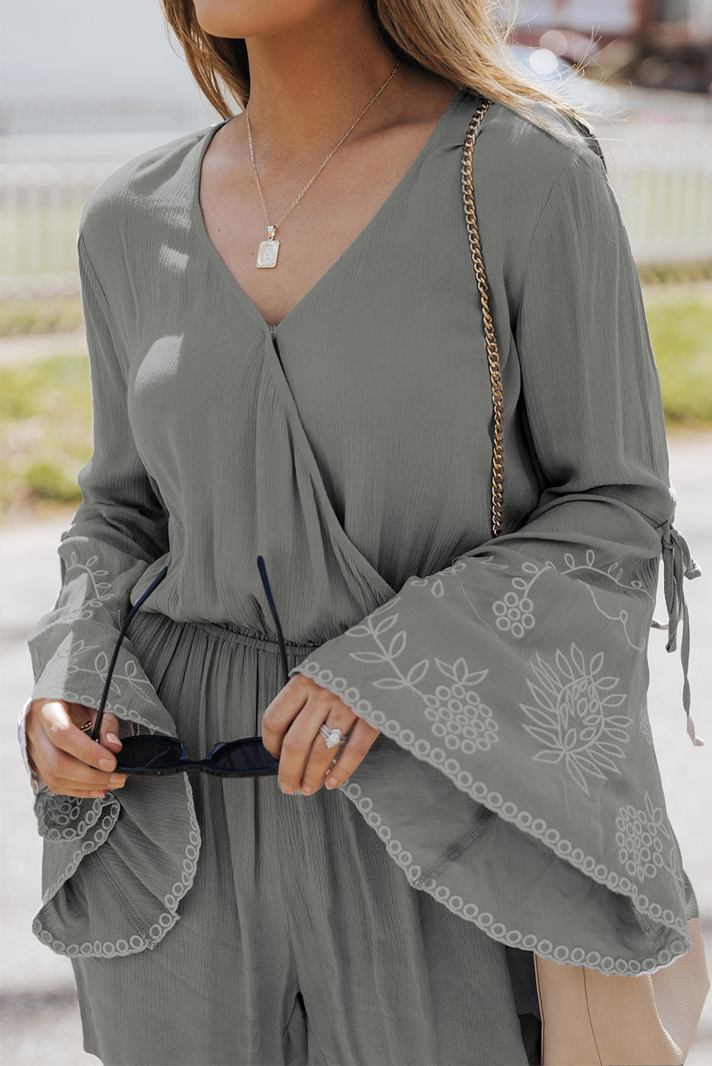 Surplice V Neck Floral Bell Sleeve Romper