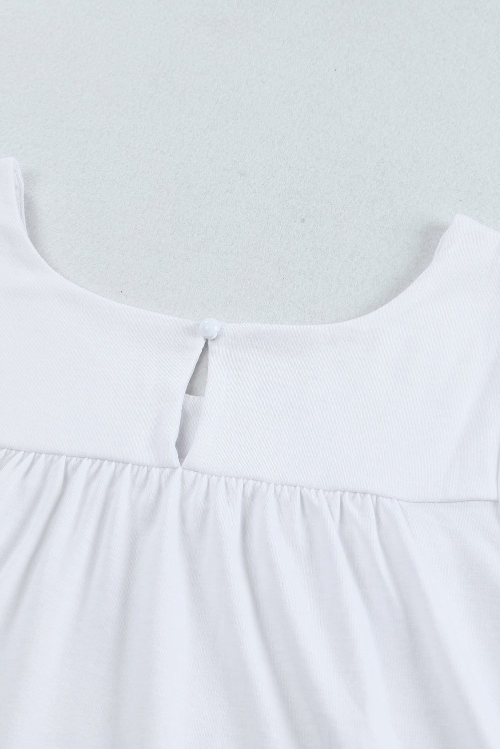 White Keyhole Back Ruffled Sleeveless Top