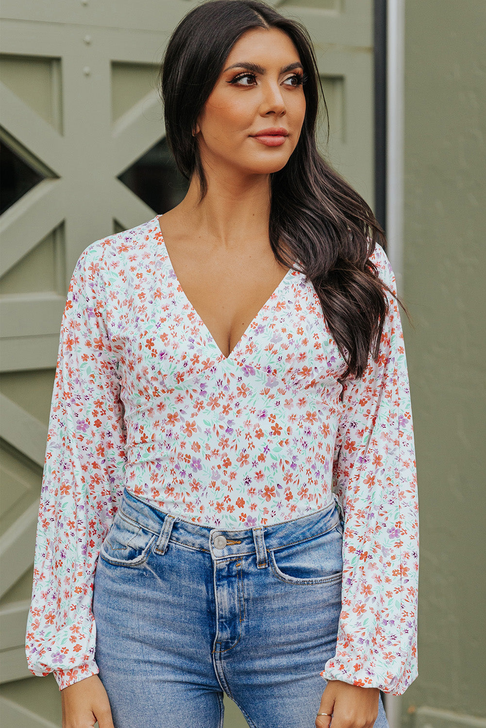 Plunging V Neck Floral Bodysuit